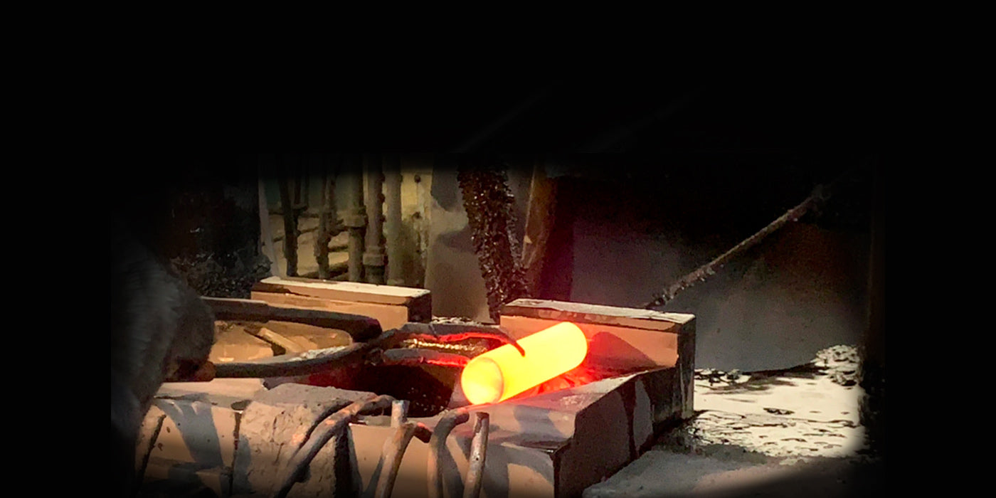 What is 'single-rod forging' of pure titanium and soft iron rods?